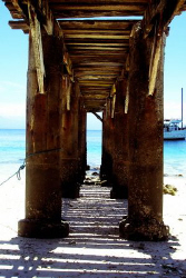 Abandoned dock in Babusanta beach, Samal City. Canon Ixus60 by Carlos Munda 
